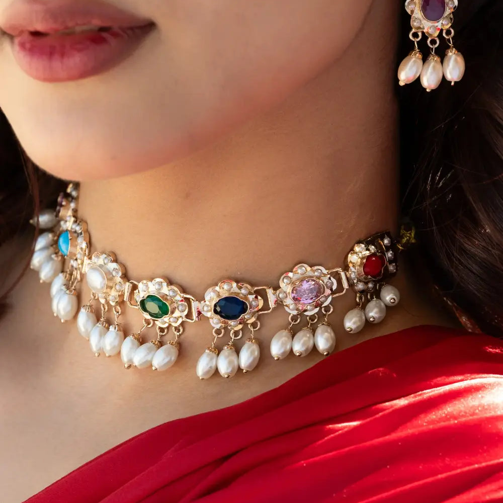 
                      
                        Navratan Jadau Necklace Set
                      
                    