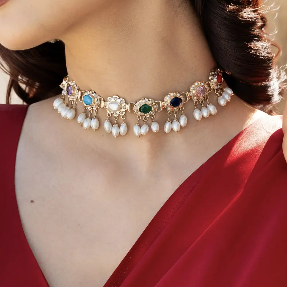 
                      
                        Navratan Jadau Necklace Set
                      
                    