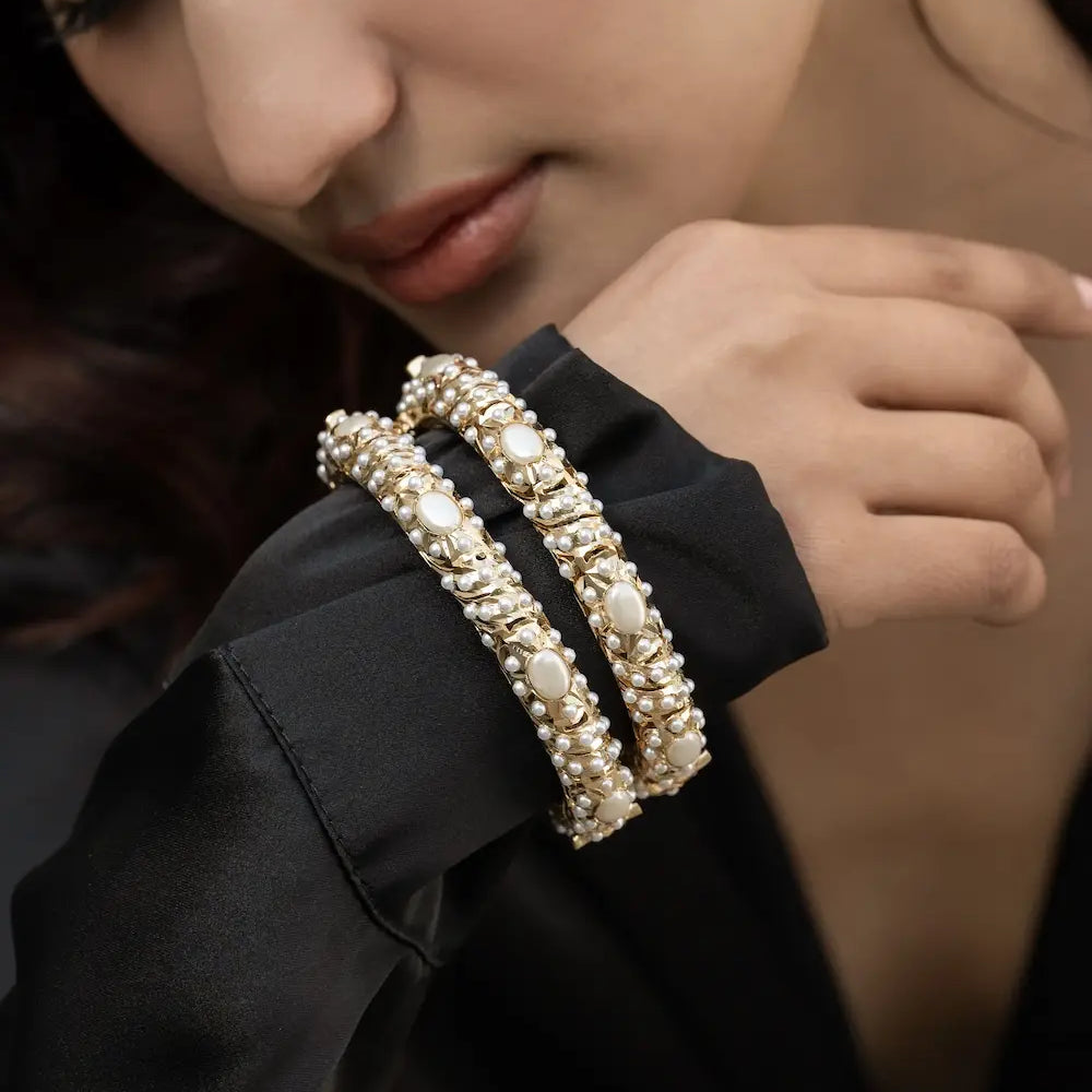 
                      
                        Jadau Pearl Bangles -Set Of 2
                      
                    