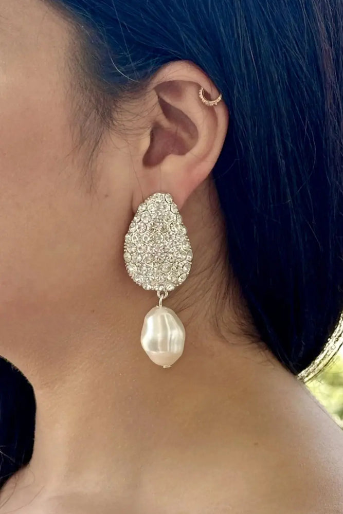 
                      
                        Pearl Drops
                      
                    